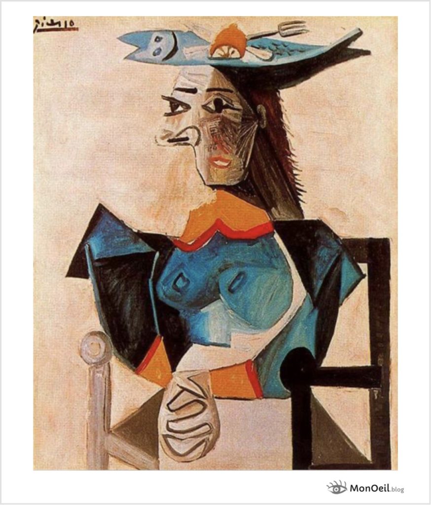 Femme assise avec un poisson de Pablo Picasso